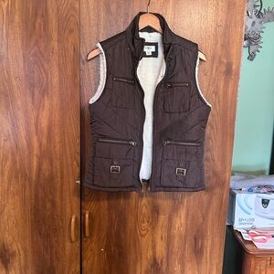 Girls Cato Brown Quilted Vest with cream Lining hood that snaps on is gone.